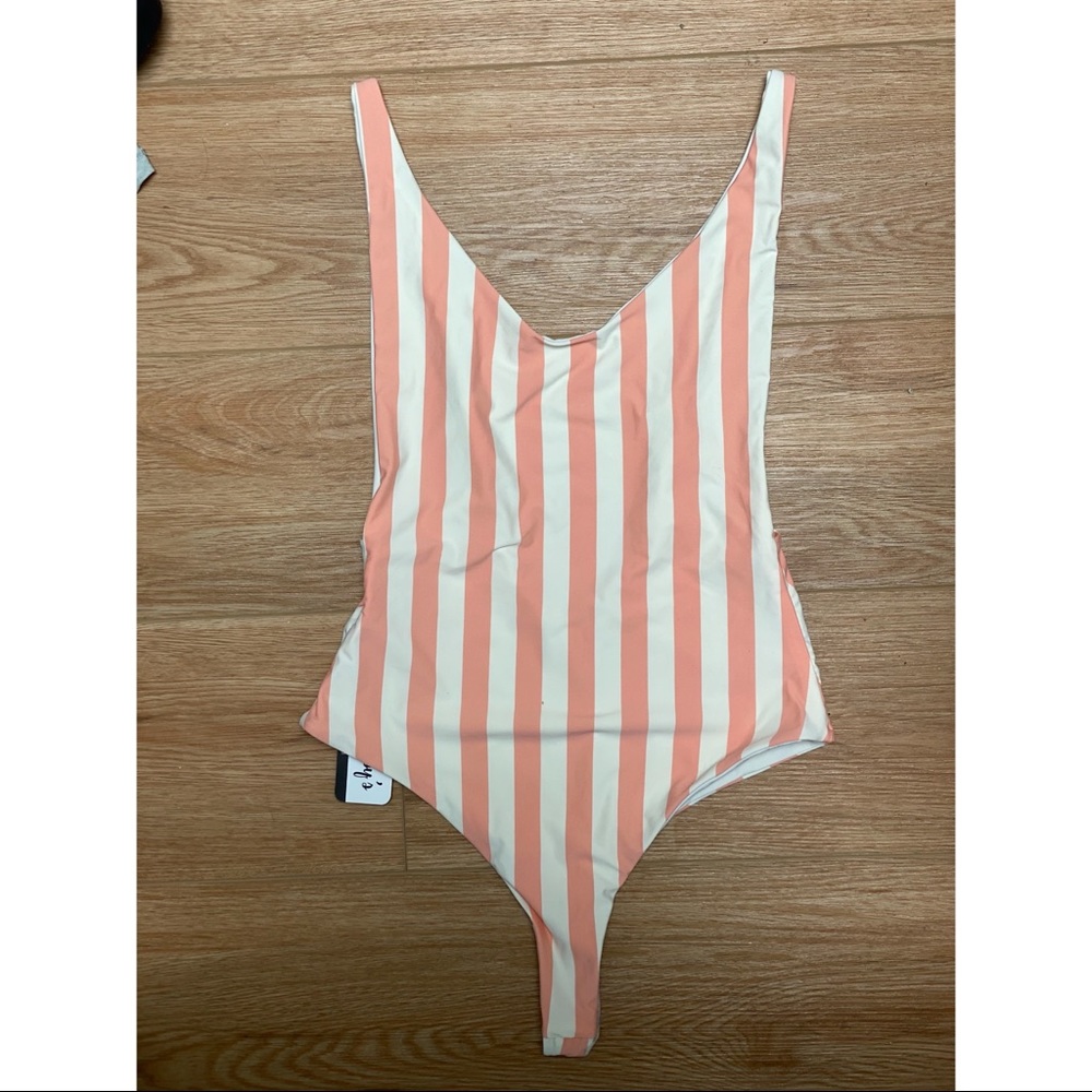 Dippin Daisy’s one piece bathing suit pink stripe